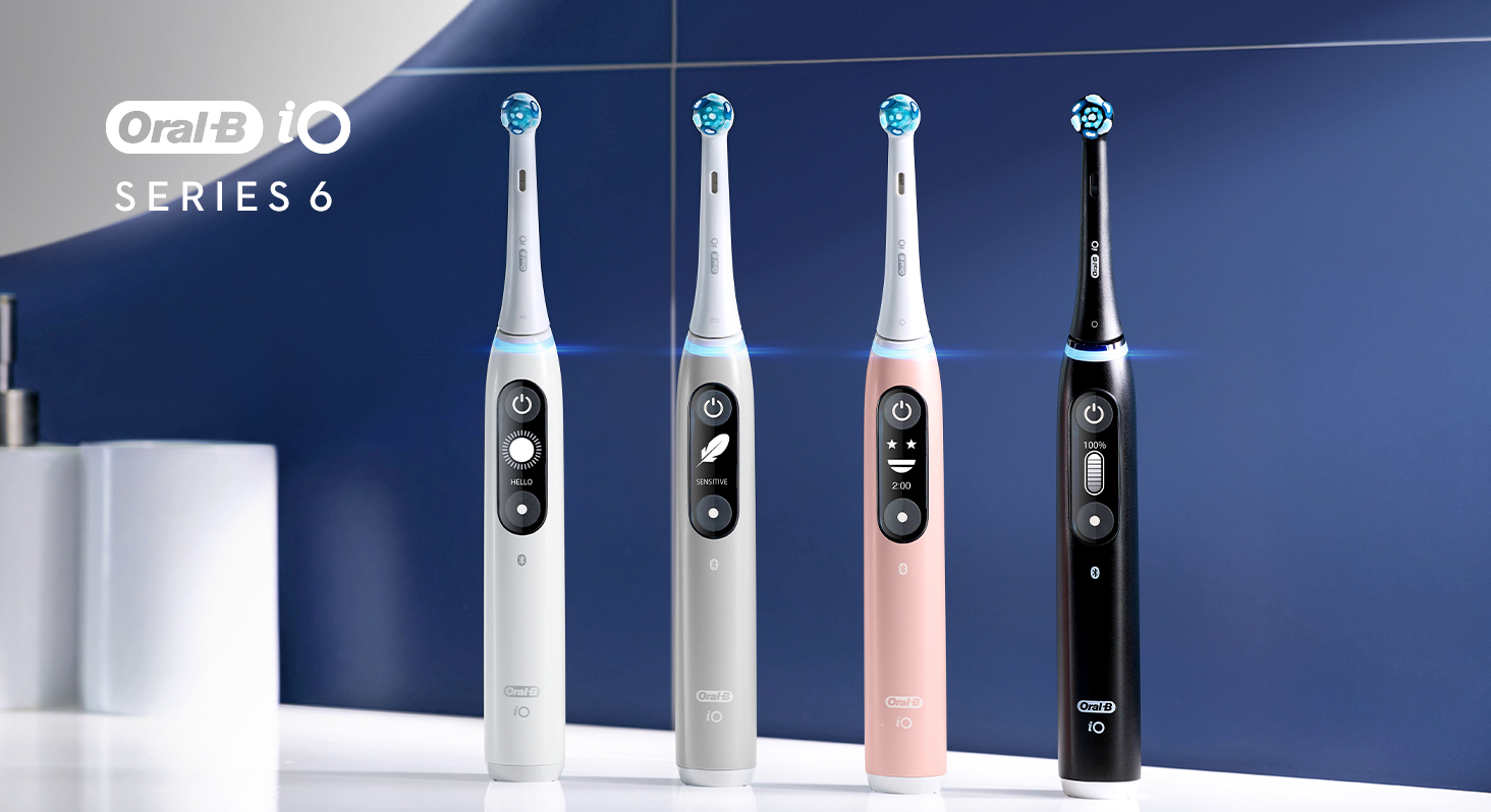 Oral-B iO Series 9 electric toothbrush collection on white marble counter