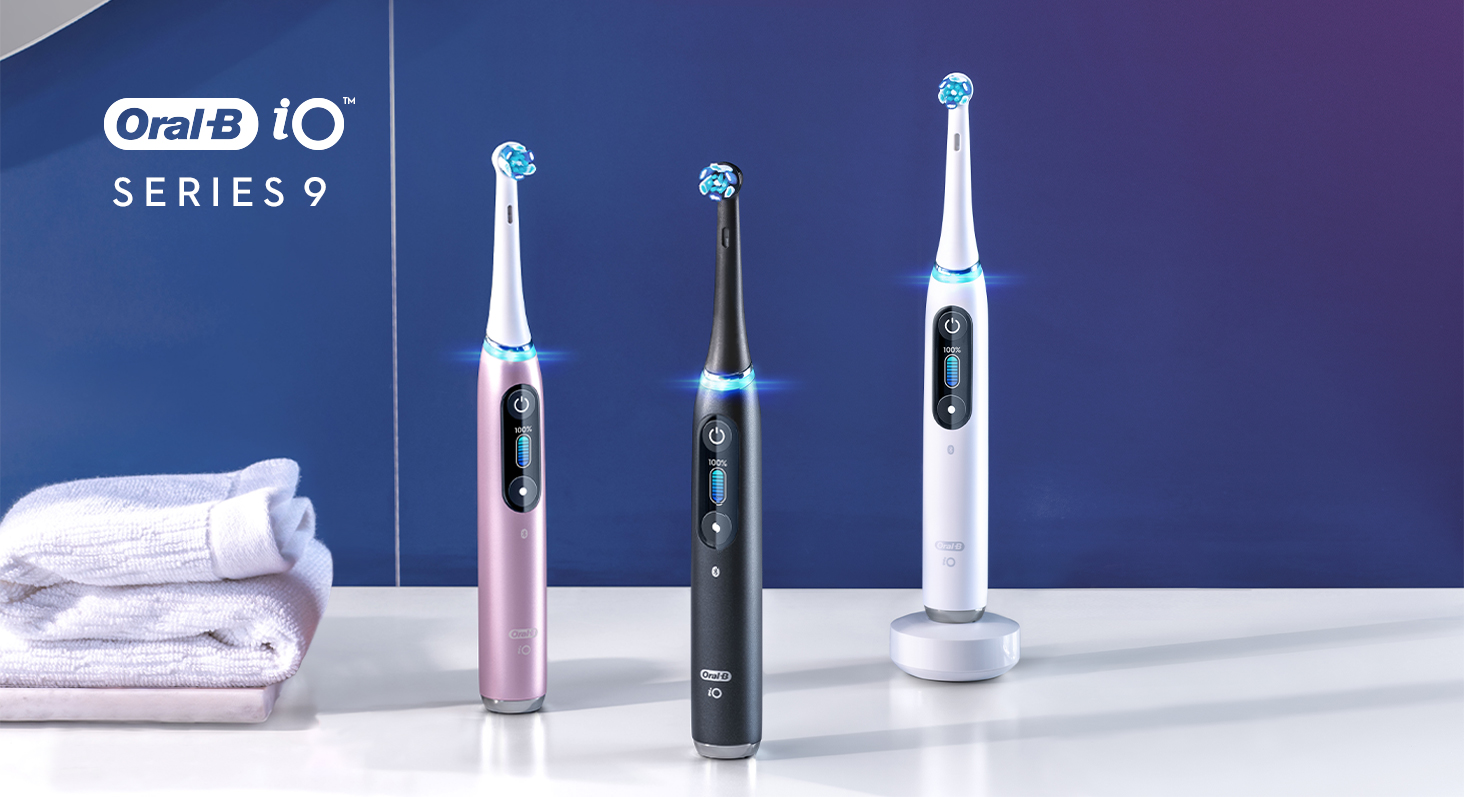 Oral-B iO Series 9 electric toothbrush collection on white marble counter